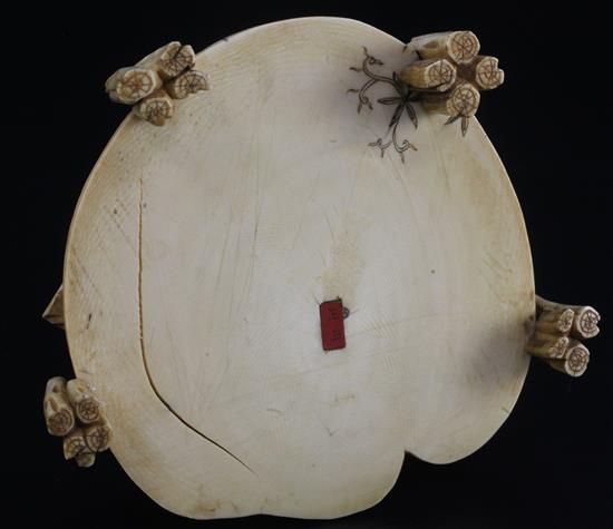 A Japanese ivory okimono of a man and two boys, signed Shomi, Meiji period 13cm, some faults